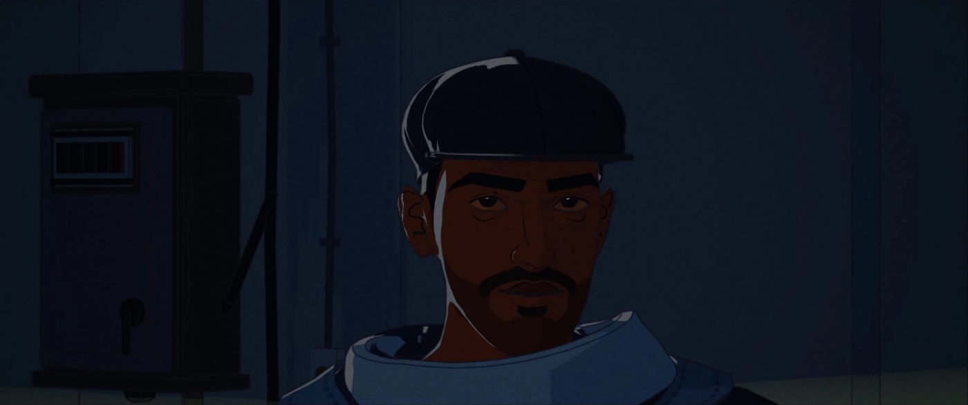 Dali in a cap, facing the camera in a dark blue room.