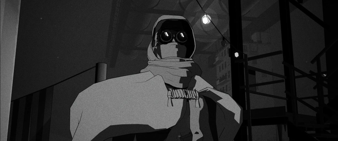A hooded figure in goggles under hanging bulbs.
